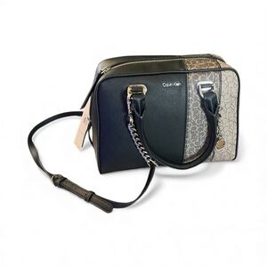Brand new with tag . Calvin Klein Black and Cream Satchel